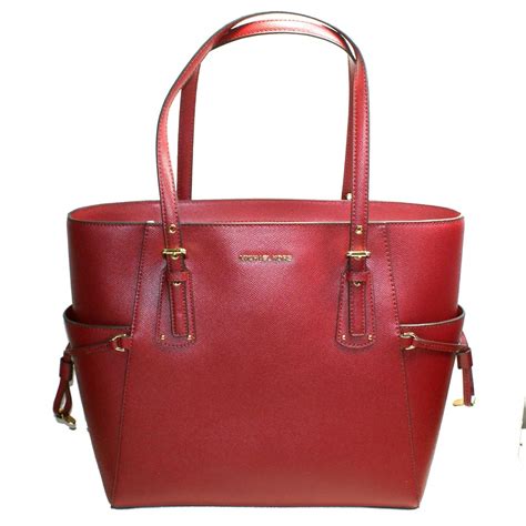 Michael Kors maroon handbags